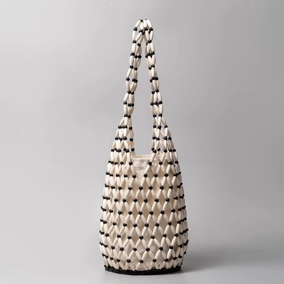 Kaiya bag-your beachside essential. Effortless, elegant, undeniably summer.