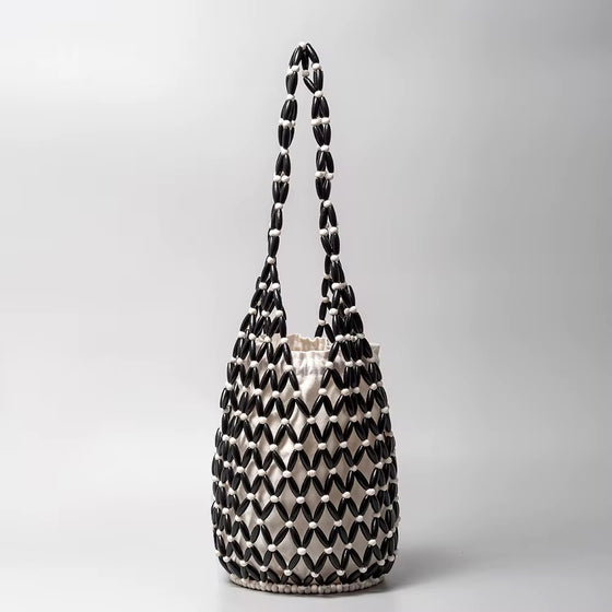 Kaiya bag-your beachside essential. Effortless, elegant, undeniably summer.